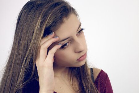 Closeup of unhappy girl feeling illの写真素材
