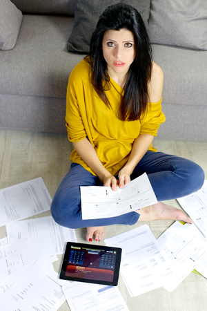 Unhappy woman full of debtsの写真素材