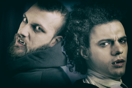 Angry and sad vampires looking cameraの写真素材