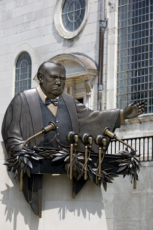 FULTON, MISSOURI July 1, 2015: Don Wiegand?s bronze sculpture commemorates Winston Churchill's"Iron Curtain" speech.  Location is outside National Churchill Museum, on the campus of Westminster College, Fulton, Missouriのeditorial素材
