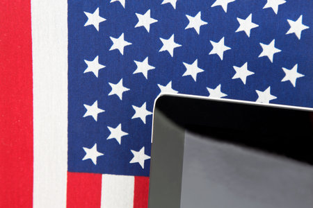 Remote learning and hybrid education are new alternatives in American schools shown with tablet and...