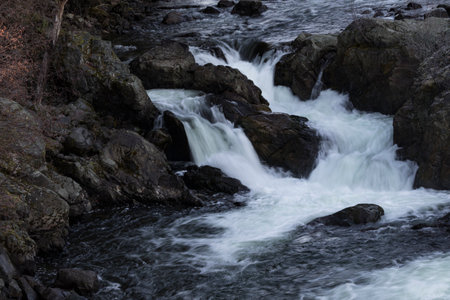 Rushing, falling water of Chance Creek on scenic Sea to Sky Highway, Squamish to Whistler segment, in British Columbia, Canadaの写真素材