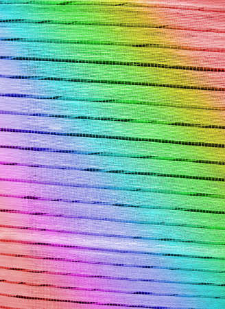 abstract rainbow textile closeup, cloth seamless background conceptの写真素材