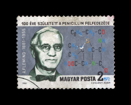 HUNGARY - CIRCA 1981: cancelled grunge stamp printed in Hungary, shows famous medical specialist, penicillin creater A. Fleming (1881-1955) with drug formula, circa 1981.の写真素材