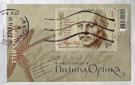 UKRAINE - CIRCA 2010: cancelled stamp printed in Ukraine, shows first ukrainian constitution by Pylyp Orlyk (1672-1742), circa 2010. 300 year anniversary celebration. vintage post stamp on white background.のeditorial素材