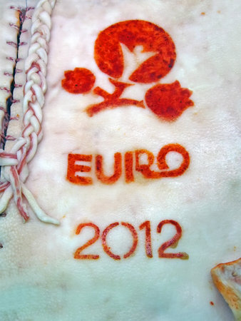 Euro 2012 championship symbols on salo with red pepper and pigtail, fresh food diversityのeditorial素材