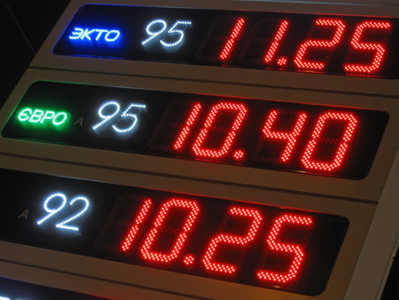 benzin price diversity, color night power illumination. text on russian with info about fuel typeのeditorial素材