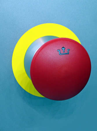 one red button on metallic surface, new security detailsの写真素材