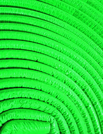 abstract uneven round material, green roll detailsの写真素材