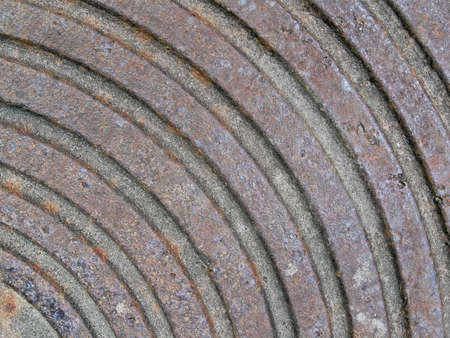 abstract rusty metall surface with round rings, industry details, manhole partの写真素材
