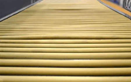 yellow industrial roll  line, modern production detailsの写真素材