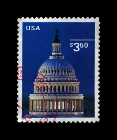USA - CIRCA 2001  stamp printed in USA, shows Capitol Dome, circa 2001  vintage post stamp isolated on black background  の写真素材