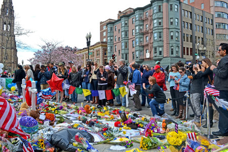 BOSTON - APR 20: People poured over the memorial set up on Boylston Street in Boston, USA on April...