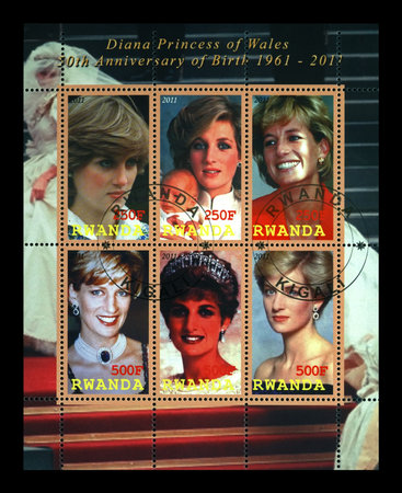 princess Diana, cancelled stamp printed in Rwanda dedicated to 50th anniversary of birth of princess Diana, circa 2011. vintage post stamp isolated on black background.のeditorial素材