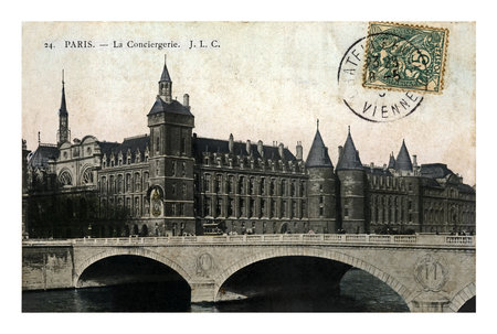 PARIS, FRANCE - CIRCA 1908s: vintage canceled postcard printed in France shows Palais de Justice, Conciergerie and Pont au Change, circa 1908s. The bridge was built during 1858-1860.のeditorial素材