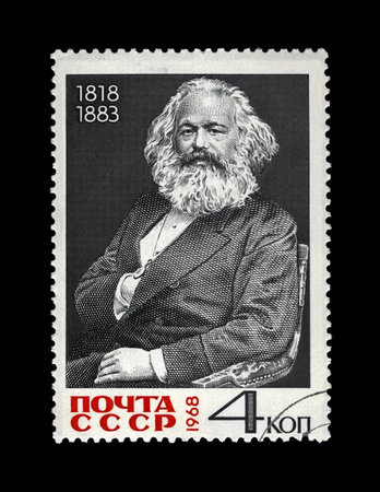 Karl Marx, famous politician leader, Capital book author, USSR, circa 1968. canceled vintage postal stamp printed in the Soviet Union isolated on black background.のeditorial素材