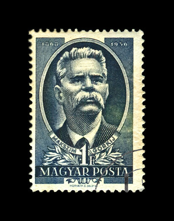 HUNGARY - CIRCA 1951: canceled stamp printed in the Hungary shows Maxim Gorky aka Alexei Maximovich Peshkov (1868-1936), famous Russian writer, dramatist, politician, 15th anniversary of the death of Gorki, circa 1951. vintage postal stamp isolated on blaのeditorial素材