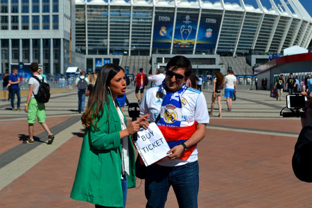 Real Madrid football fan looking for tickets before UEFA Champions League Final 2018 on May 26, 2018 in Kiev, Ukraine. FC Real Madrid and FC Liverpool Final game take place on May 26, 2018.のeditorial素材