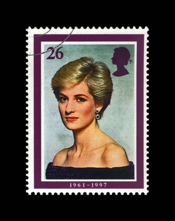 Diana, Princess of Wales, circa 1997. canceled postal stamp printed in United Kingdom (Great Britain) dedicated to the memory of Lady D. vintage post stamp isolated on black background.のeditorial素材