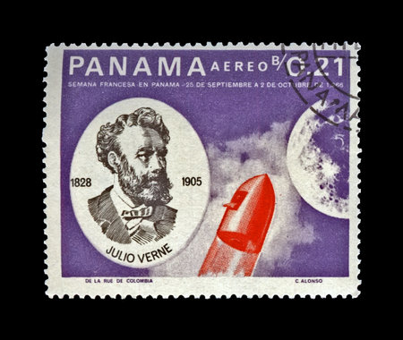 Jules Verne (1828-1905), famous fantastic science writer and capsule heading toward Moon, French Space Explorations, circa 1966.  canceled vintage postal stamp printed in Panama isolated on black background.のeditorial素材