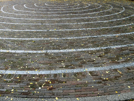 abstract white brick spiral street diversity background, vintage stone square with leafs and rain...