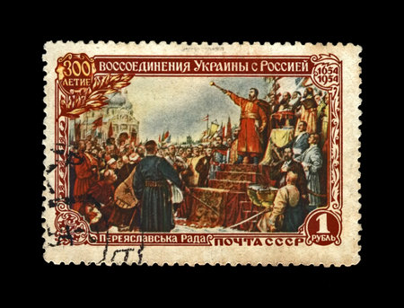 hetman Bogdan Khmelnitsky proclaming reunion of Ukraine and Russia during Pereyaslav Council in 1654, circa 1954. vintage canceled post stamp printed in USSR isolated on black background.のeditorial素材