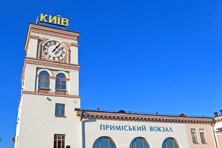 KIEV, UKRAINE - NOV 08, 2018: Kyiv message with large clocks on the tower of main railway domestic station building on November 08, 2018 in Kiev, Ukraine.の写真素材