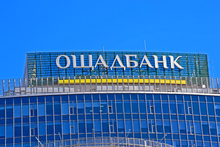 State Savings Bank of Ukraine aka Oschadbank signboard on March 23, 2021 in Kiev, Ukraine. It was found in 1991.のeditorial素材