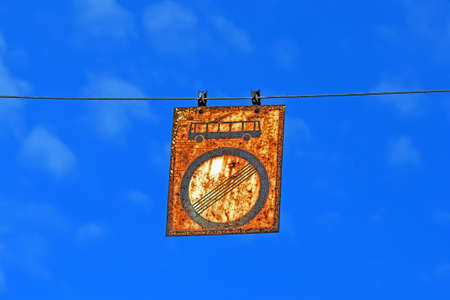 vintage rusty road sign (the end of all prohibitions and restrictions) on metal signboard on blue sky, security travel diversityの写真素材