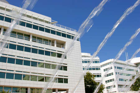office building with blurred water springの写真素材