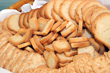 bunch of cookies and toated bread for cheese