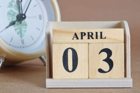 April 3, Cover design with clock in natural concept.の写真素材