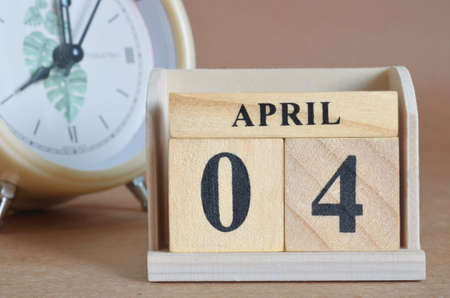 April 4, Cover design with clock in natural concept.の写真素材