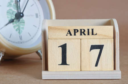 April 17, Cover design with clock in natural concept.の写真素材