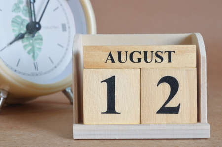 August 12, Cover design with clock in natural concept.の写真素材