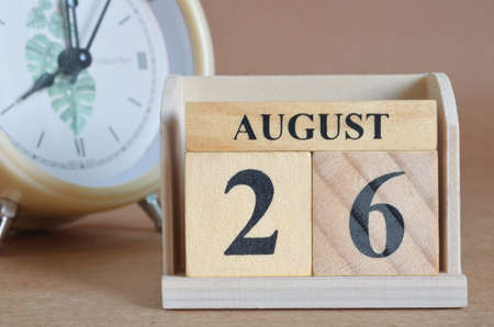 August 26, Cover design with clock in natural concept.の写真素材