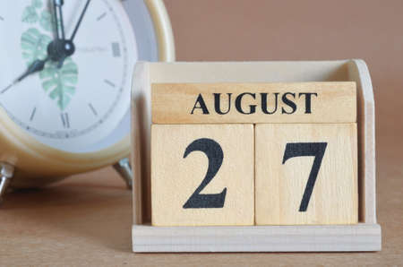 August 27, Cover design with clock in natural concept.の写真素材