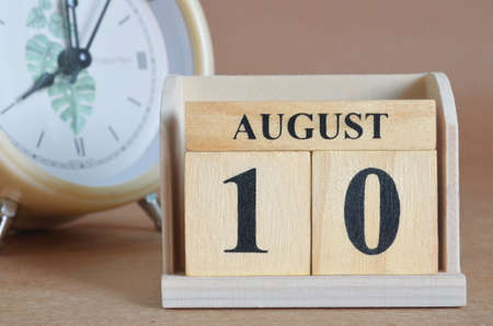 August 10, Cover design with clock in natural concept.の写真素材