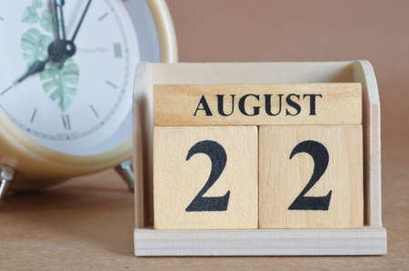 August 22, Cover design with clock in natural concept.の写真素材