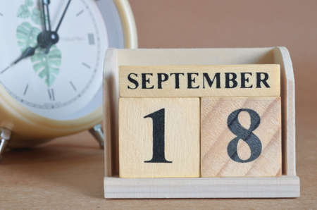 September 18, Cover design with clock in natural concept.の写真素材