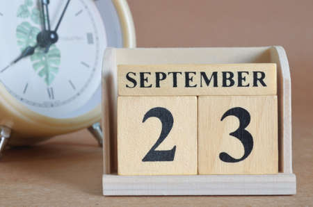 September 23, Cover design with clock in natural concept.の写真素材