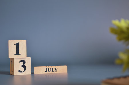 July 13, Cover in the evening time, Date Design with number cube for a background.の写真素材