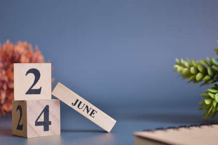 June 24,  Date Design with number cube for a background.の写真素材