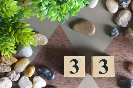 Rank number 33, Rating, Award, Design with number cube colorful stone in the natural concept.の写真素材