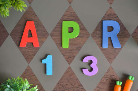 April 13, Birthday for kids with colorful wooden text design for the background.の写真素材