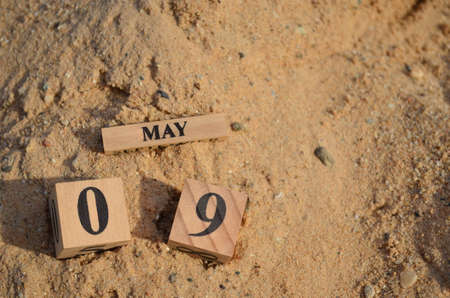 May 9, Number cube with Sand background.の写真素材