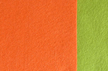 Orange and green felt fabric texture for background.の写真素材