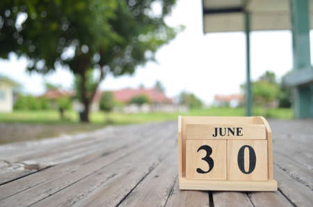 June 30, Number cube with a natural background.の写真素材