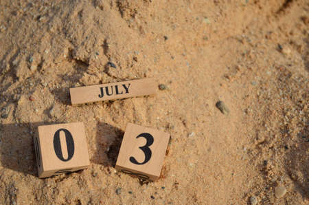 July 3, Number cube with Sand background.の写真素材