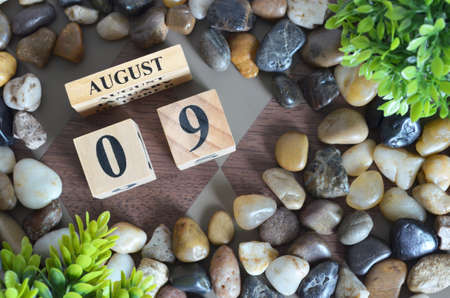 August 9, Background with number cube, colorful stone, design in natural concept.の写真素材